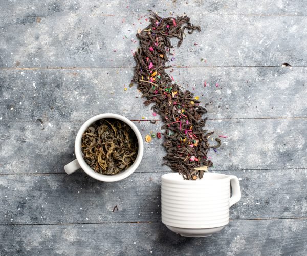top-view-fresh-dried-tea-inside-outside-cup-grey-rustic-space
